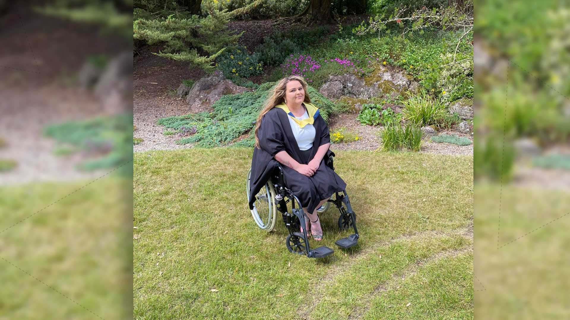 The image shows graduate Rochelle humes posing in her graduation gown in a garden.