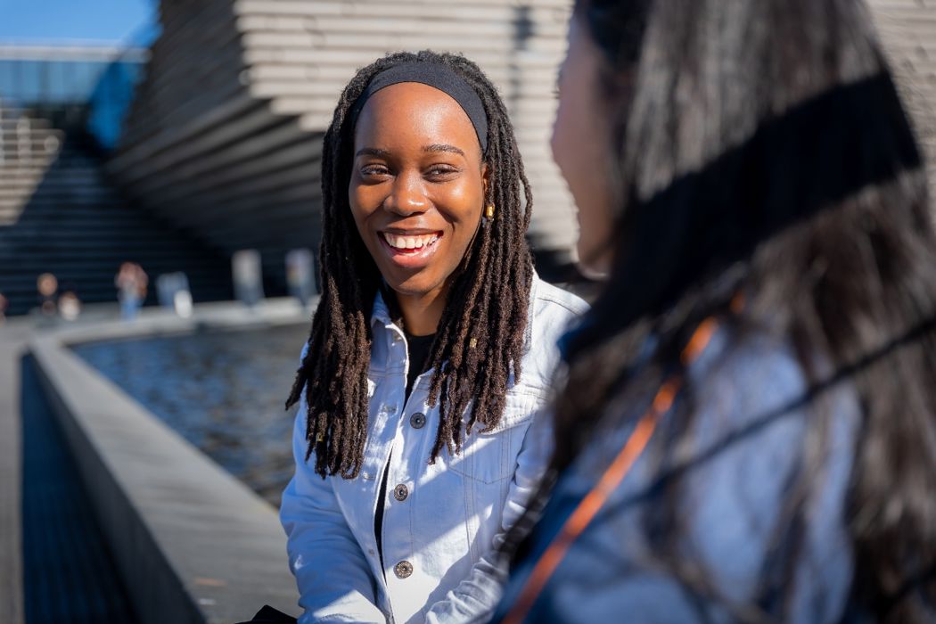 Smiling girl outside V&A Dundee