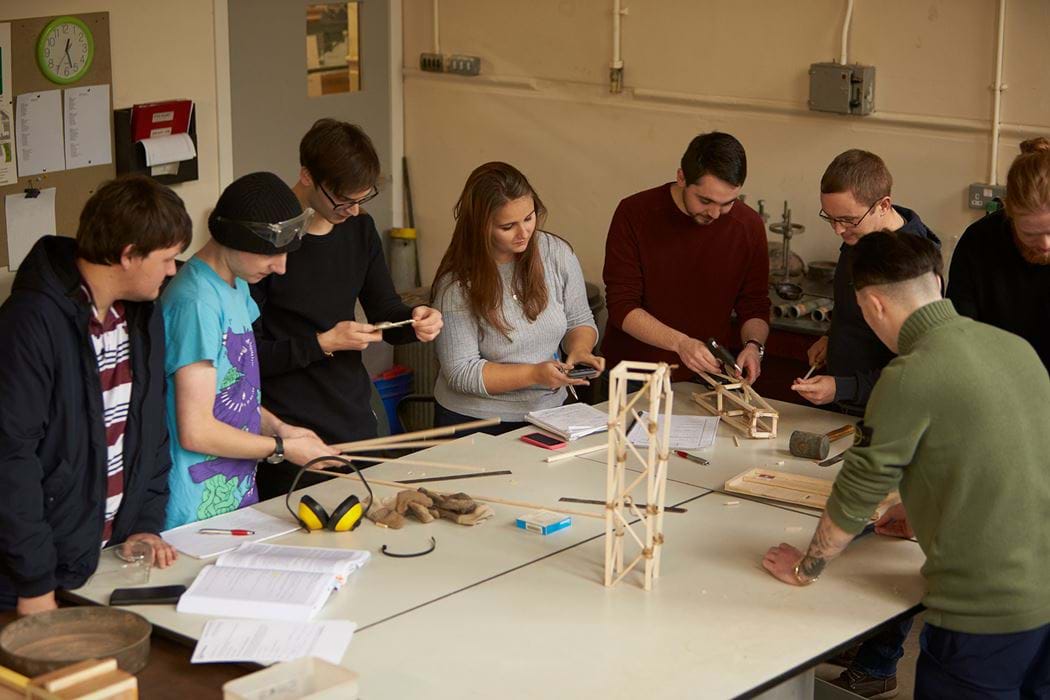 Group of engineering students working together