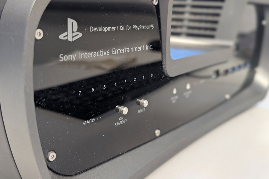 An image of PlayStation 5 development hardware, situated in a computer lab.