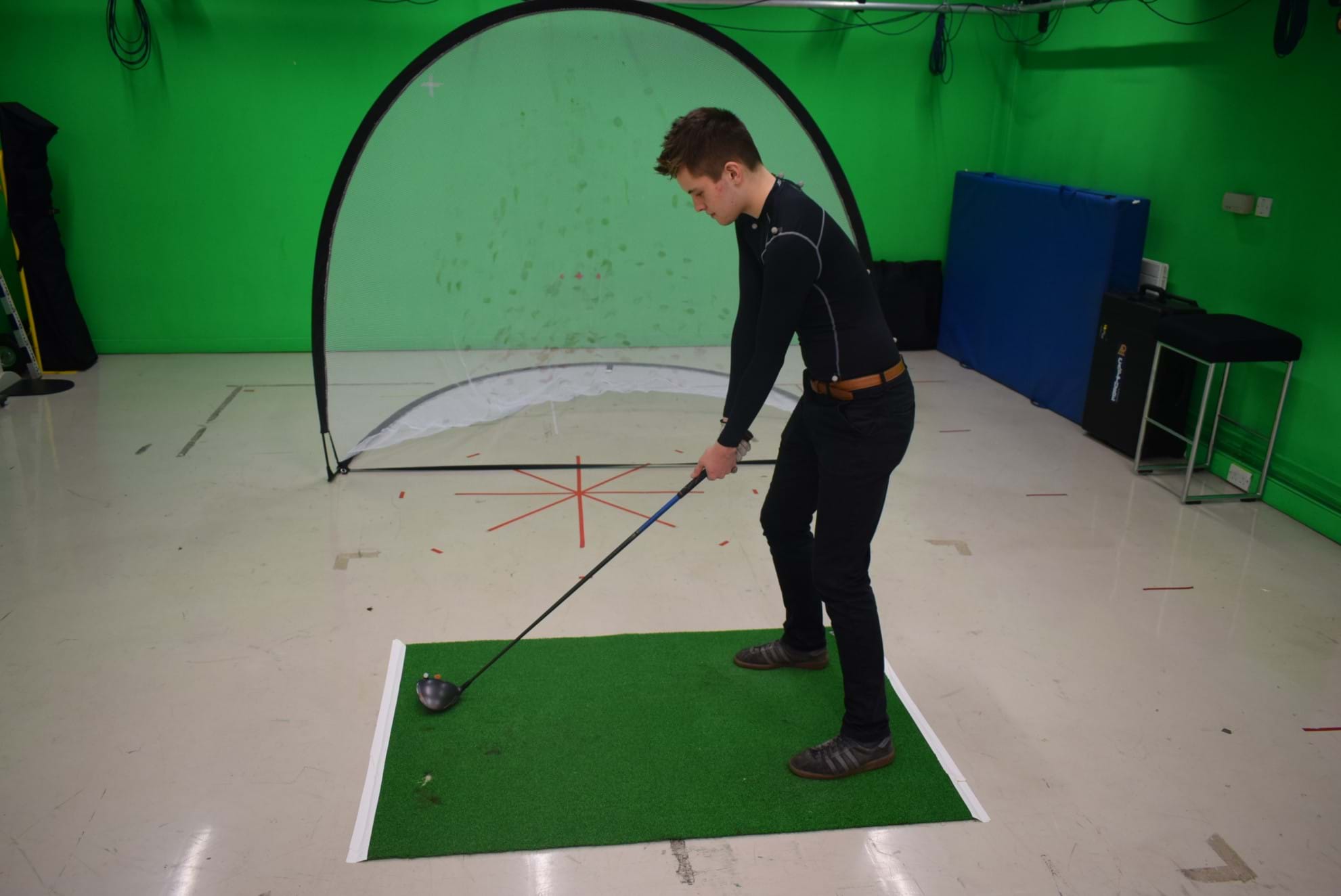 A golfer in a motion capture suit