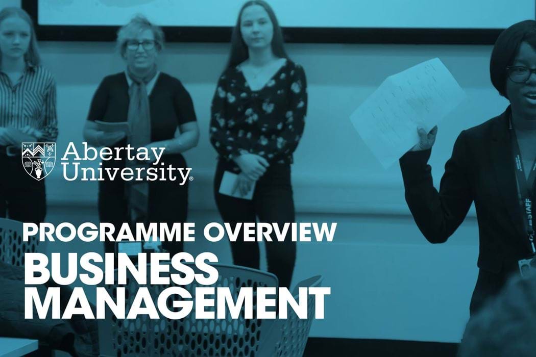 The thumbnaail image for the Business Management programme video is of a lecturer presenting in front of a classroom,