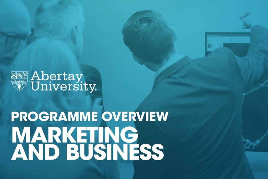 The thumbnail image for the Marketing and Business programme video is of someone doing a presentation to a group of people.