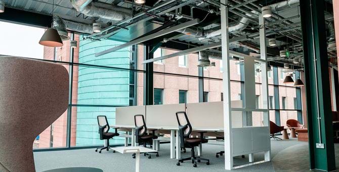The Abertay cyberQuarter launch photos! Open plan office space with desks and chairs  #12